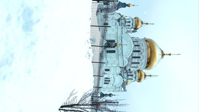 Belogorsky St. Nicholas Orthodox Missionary Monastery. Russia, Perm Krai, Belaya Gora. The temple on the hill in winter. Monastery on the background of snow. 4K