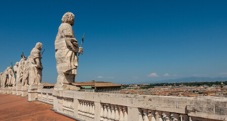 Fototapeta na wymiar A View From Above: The Vatican's Rooftop Statue