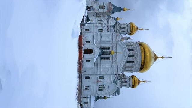 Belogorsky St. Nicholas Orthodox Missionary Monastery. Russia, Perm Krai, Belaya Gora. The temple on the hill in winter. Monastery on the background of snow. 4K