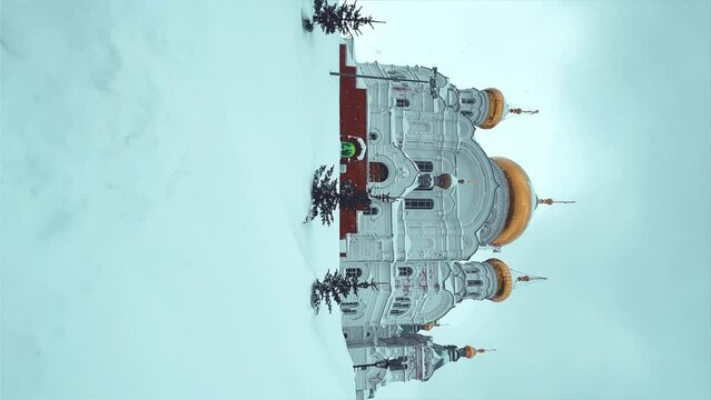 Belogorsky St. Nicholas Orthodox Missionary Monastery. Russia, Perm Krai, Belaya Gora. The temple on the hill in winter. Monastery on the background of snow. 4K