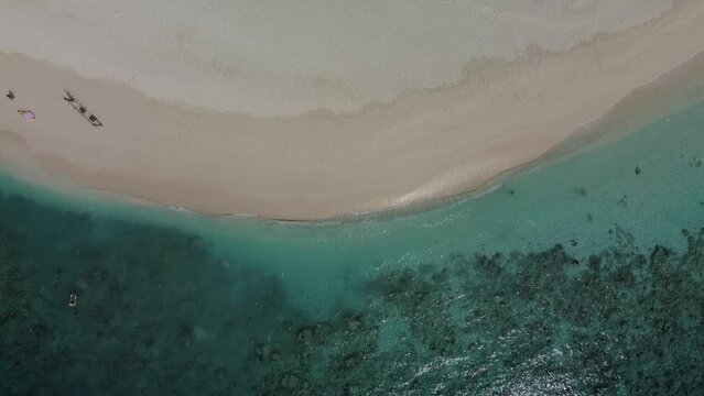 Tropical paradise with blue sea and green island in the maldives