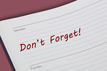 Dont Forget diary reminder appointment open on desk