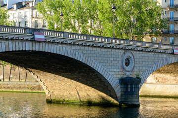 Fototapeta premium The Pont Louis-Philippe , in Europe, in France, in ile de France, in Paris, Along the Seine, in summer, on a sunny day.