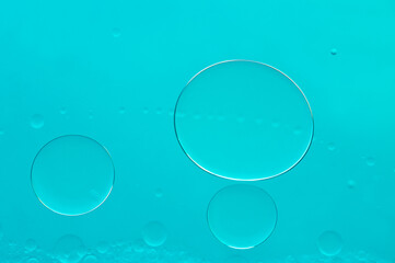 Water in full-frame close up. Gas bubbles in turquoise water
