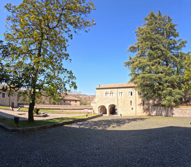 Fototapeta na wymiar View of the garden and inner courtyard of Casamari Abbey, a monumental medieval monastery located near Rome, Italy.