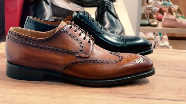 Men's brogues and derbies are on the shoe store shelf