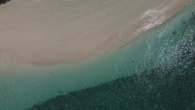 Tropical paradise with blue sea and green island in the maldives
