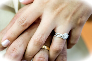 Two hands with rings during a wedding