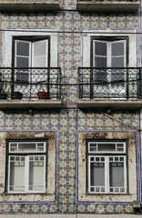 Typical tiled facades and windows of Lisbon