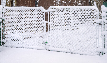 Sticky Wet Snow Fence from Morning Winter Storm