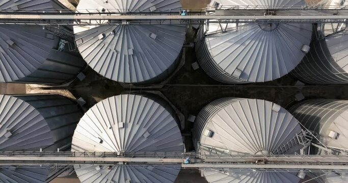 flight over agro silos granary elevator on agro-processing manufacturing plant