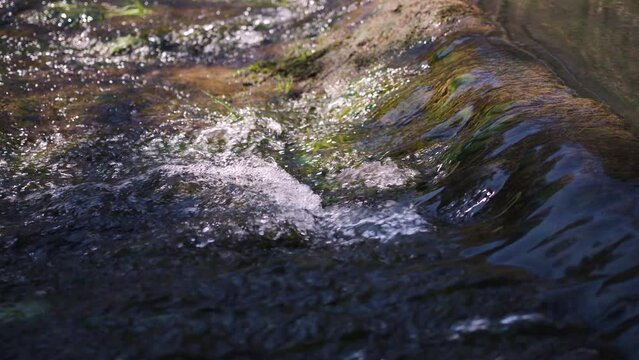 Close-up of the rapids on the water in slow motion