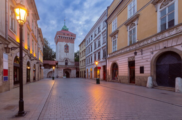 Fototapeta na wymiar Krakow. Market square in the night lights at sunrise.
