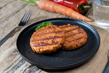 Tasty vegan burgers made from vegetarian plant based soya beans imitation meat