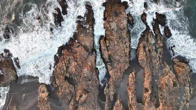 Drone aerial view of arco Calan coast near Constitucion Chile, Pacific ocean, Top view