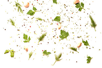 Kitchen screensaver of spices and seasonings. Spices and seasonings are laid out on a white background.