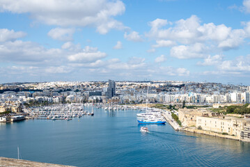 Fototapeta na wymiar View on Sliema, Malta from Valetta. City view with the blue, Mediterranean sea