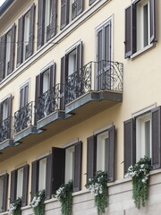 Fototapeta na wymiar Old beautiful balconies in Italy