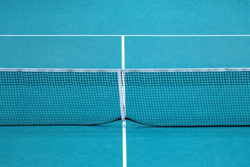 Mint color paddle tennis net and carpet court. Tennis competition concept. Horizontal sport theme poster, greeting cards, headers, website and app.