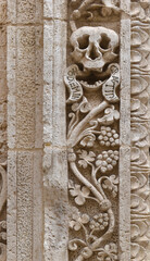 Decoration with grim reapers at the entrance of the Purgatory Church in Monopoli, Italy.