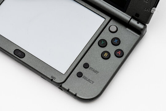 Gothenburg, Sweden - december 06 2022: Button and screen of a Nintendo 3DS handheld gaming console.