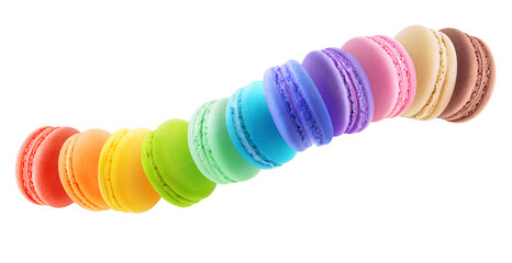 Macaroons of various flavours in long line on white background, levitation panorama