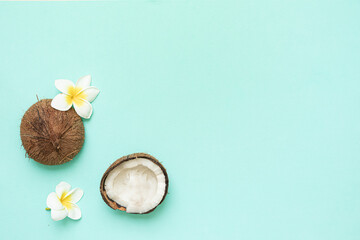 Tropical background with coconut on a blue background.