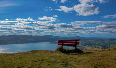 Bench at Kodak Corner on the top of Slieve Martin in Northern Ireland, looking across to the Ring of Gullion in the distance and the Cooley Mountains in Ireland and separated by Carlingford Lough