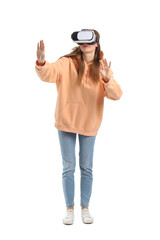 Pretty young woman in VR glasses isolated on white background