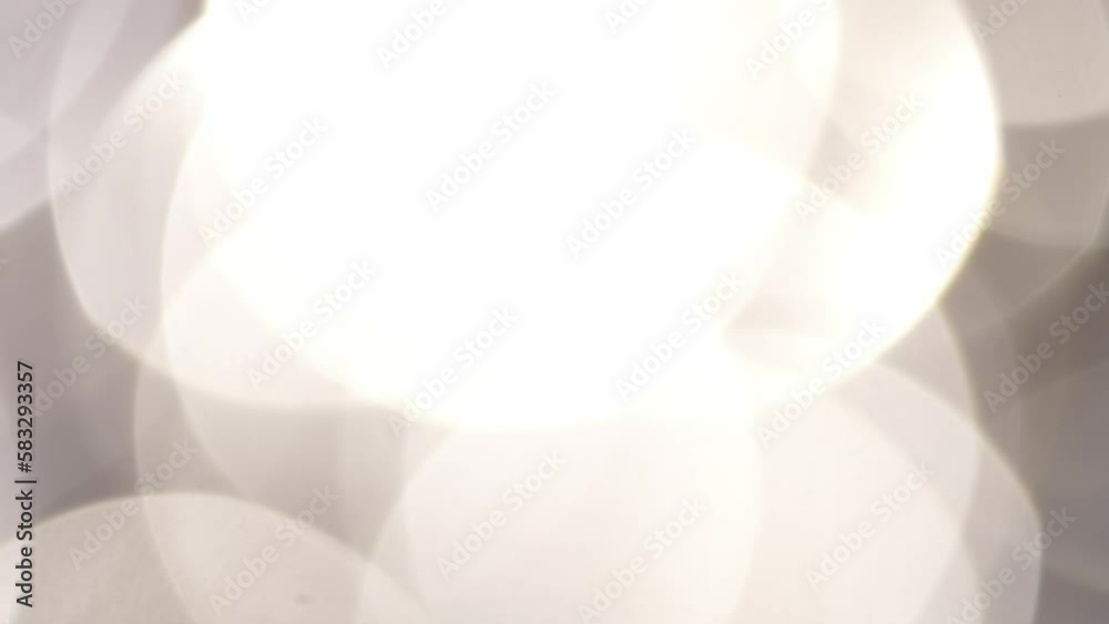 Canvas Prints smooth circular motion of large silver bokeh abstract background. slowly moving and shimmering unfoc