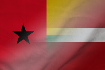 Obraz na płótnie Canvas Guinea Bissau and Latvia government flag transborder contract LVA GNB