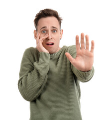 Scared young man on white background