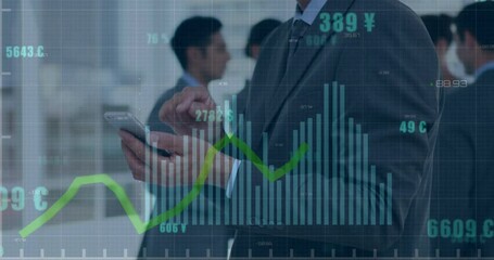 Animation of graphs and currency signs with numbers over caucasian man using mobile phone in office - Powered by Adobe