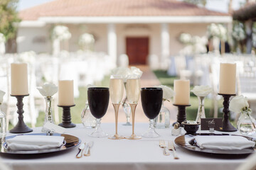 set tables waiting for the guests of the wedding ceremony
