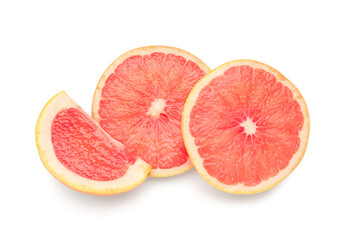 Slices of juicy grapefruit on white background