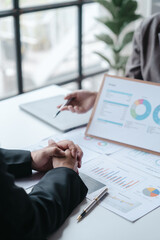 Auditor and the company's bookkeeper jointly review the balance sheet and assets, liabilities and...