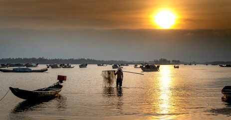 Dawn over Quang Loi Lagoon. Quang Loi commune, Quang Dien, Thua Thien - Hue, Vietnam belonging to...