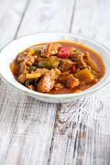stir fried sweet and sour chicken with bell pepper and onion