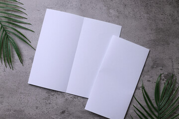Bifold white template paper on gray background