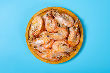 top view fresh cooked shrimps on blue