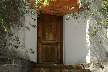 House entrance with old wooden door outdoors