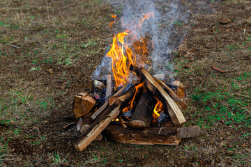 Fire in a camp in the interior of Brazil, flowing, vibrant and very rustic