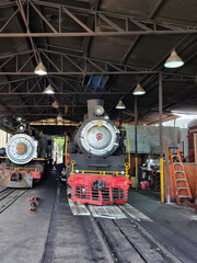 Steam locomotives for tourist trips in a maintenance workshop