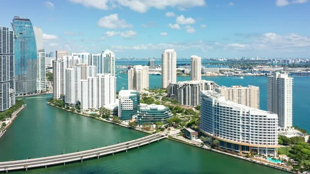 Aerial view of Miami, Florida with left panning camera motion. Miami is a majority-minority city and a major center and leader in finance, commerce, culture, arts, and international trade.