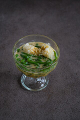ice cendol is Indonesia sweet dessert made from mungbean flour and pandan leaf juice, served with coconut milk, palm sugar and shaved ice
