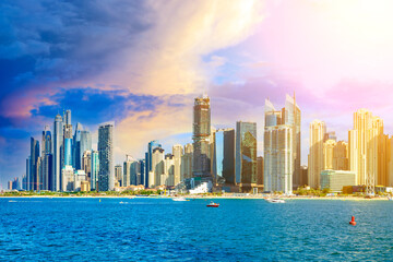 Fototapeta premium View of the Persian Gulf's golden sand beaches, the Dubai Marina, the JBR neighborhood, and the sunset. UAE vacations and holidays