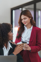 Multiethnic business people meeting and communicating at coffee break. Tax, exchange, accounting and financial advisor