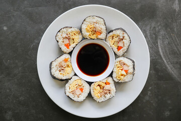 kimbap or gimbap is Korean roll Gimbap (kimbob) made from steamed white rice (bap) and various other ingredients, this food from south korea