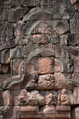 Fototapeta na wymiar Carvings on the wall of Angkor Wat, Cambodia