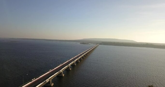 Aerial view Thepsuda Bridge over Lampao Reservoir, Thep Sada Bridge the Bridge is a 2-lane reinforced concrete bridge across Lam Pao Dam at Kalasin,Thailand.